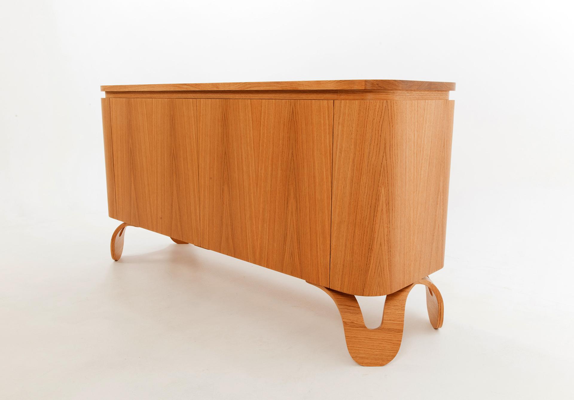 Elegant wooden sideboard with curved legs, showcasing contemporary craftsmanship and design in the Bristol creative art scene.