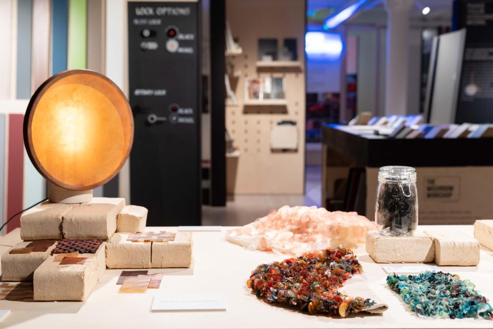 Biomaterial exhibition display featuring colorful materials, natural light fixtures, and innovative design elements at Material Source Studio.