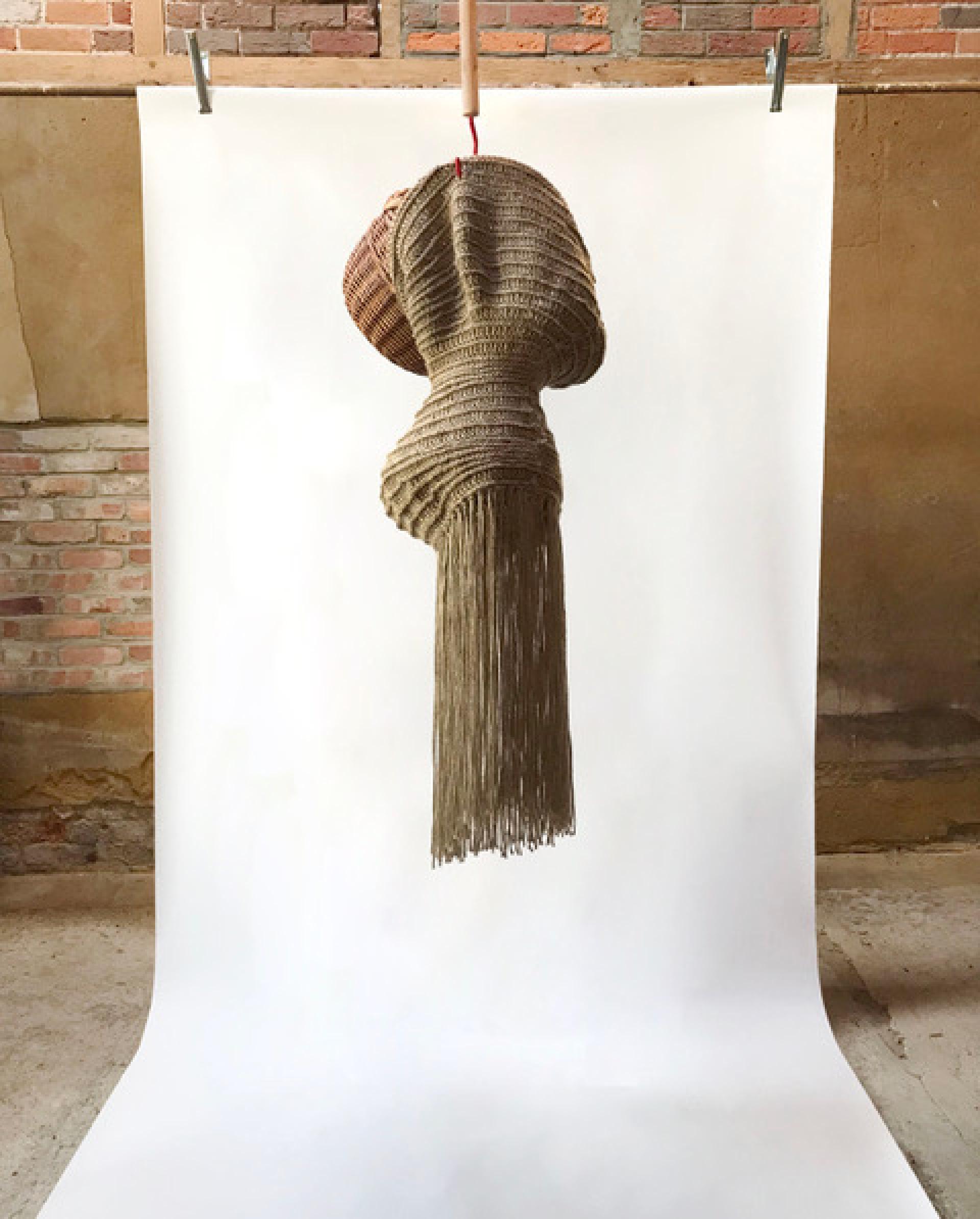 Handcrafted textile art piece with intricate patterns and fringes, showcased for Future Icons Selects at London Craft Week 2024.