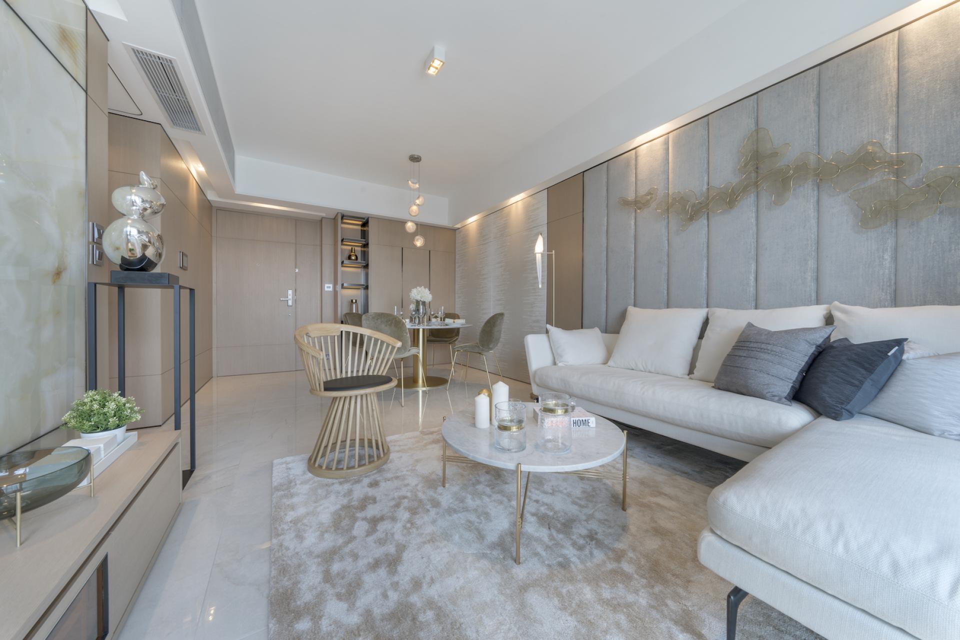 Modern Hong Kong apartment interior designed with elements of Chinese philosophy featuring a stylish living area and elegant furnishings.