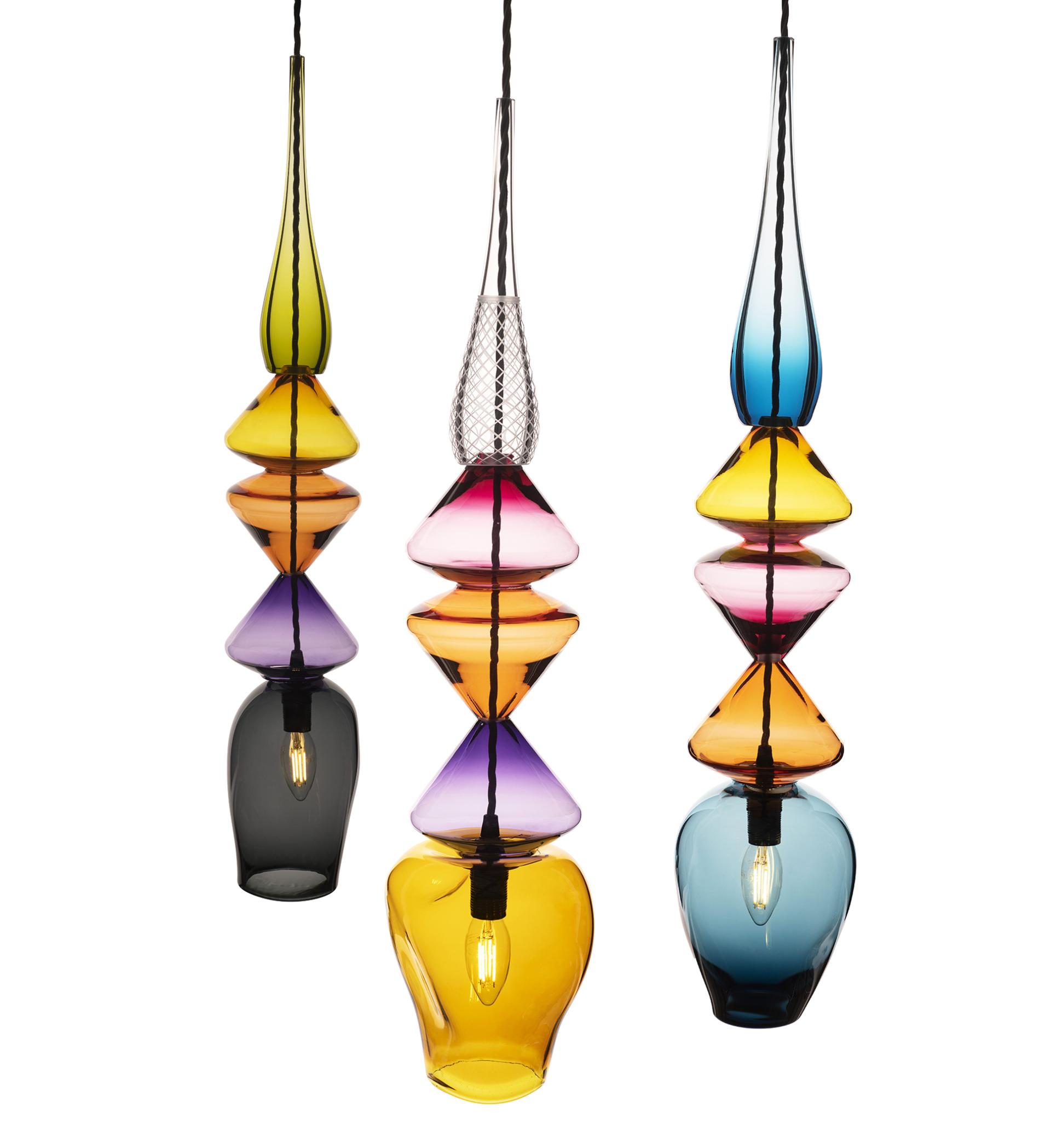 Eco-friendly hanging glass lights designed by British designer Nicola Schellander showcase vibrant colors and unique craftsmanship.