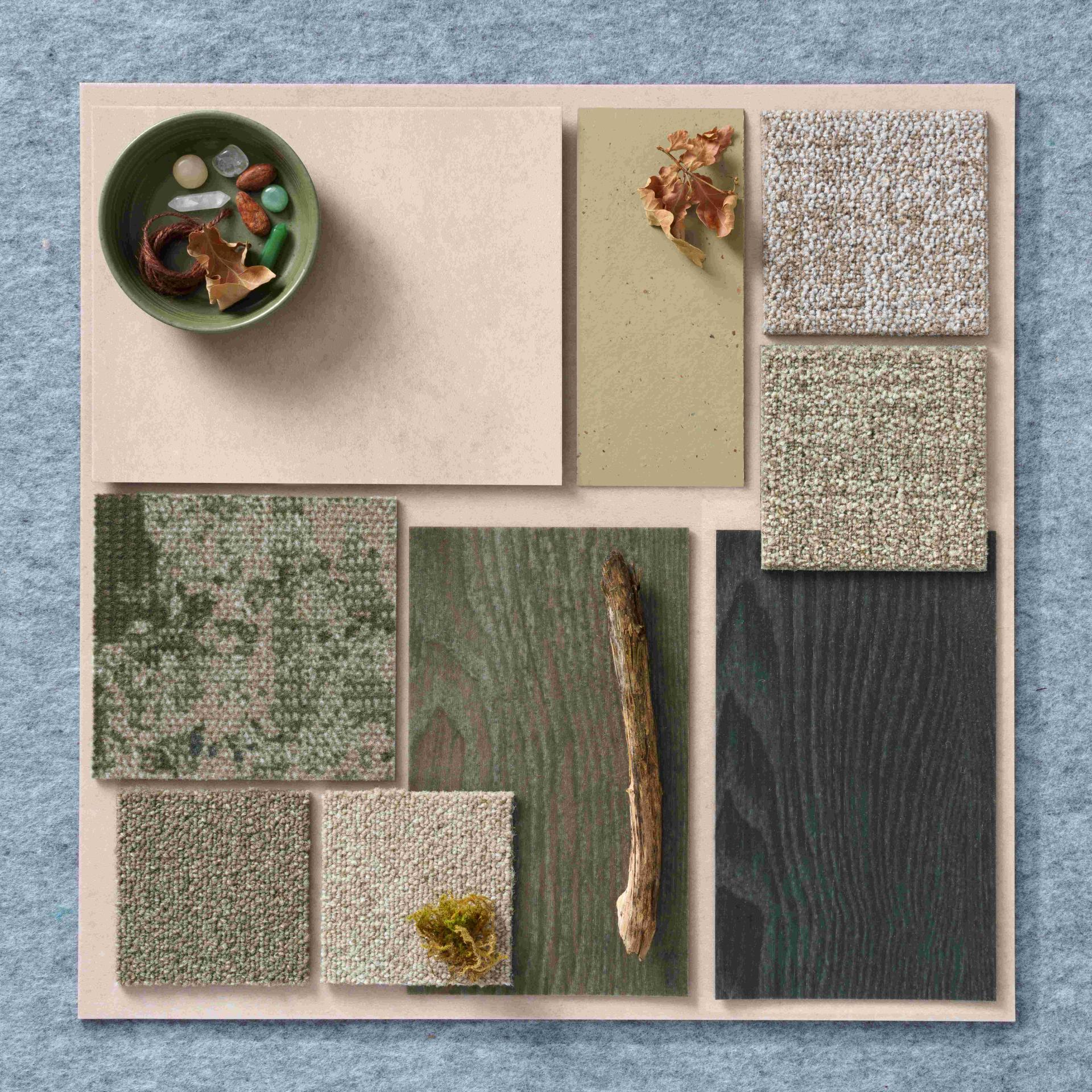 Colorful design samples of Forbo's Allura Luxury Vinyl Tiles featuring natural textures and materials for 2024 interior inspiration.