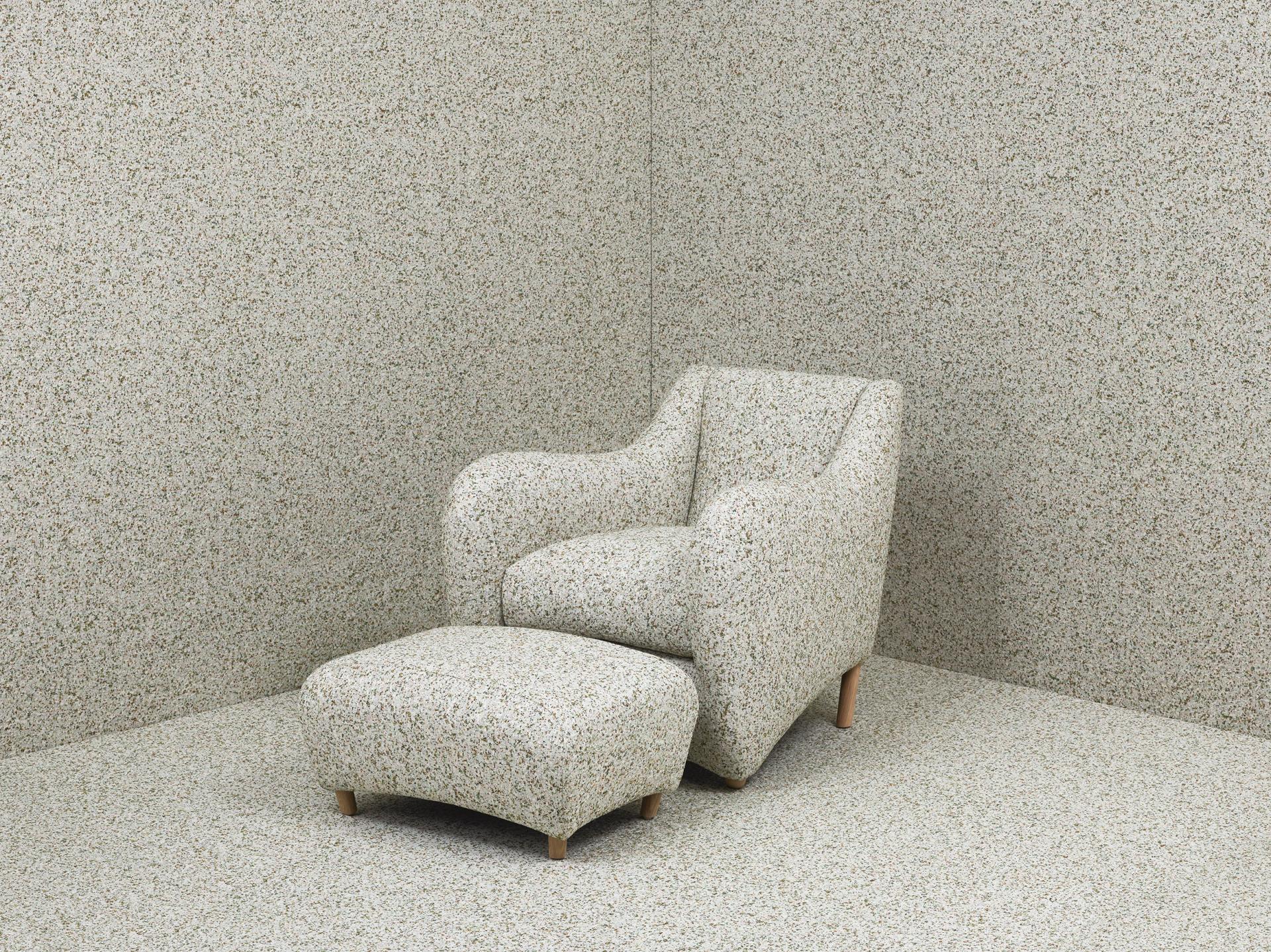 Matthew Hilton's Balzac armchair and ottoman, featuring a unique speckled design, celebrate thirty years of timeless design.