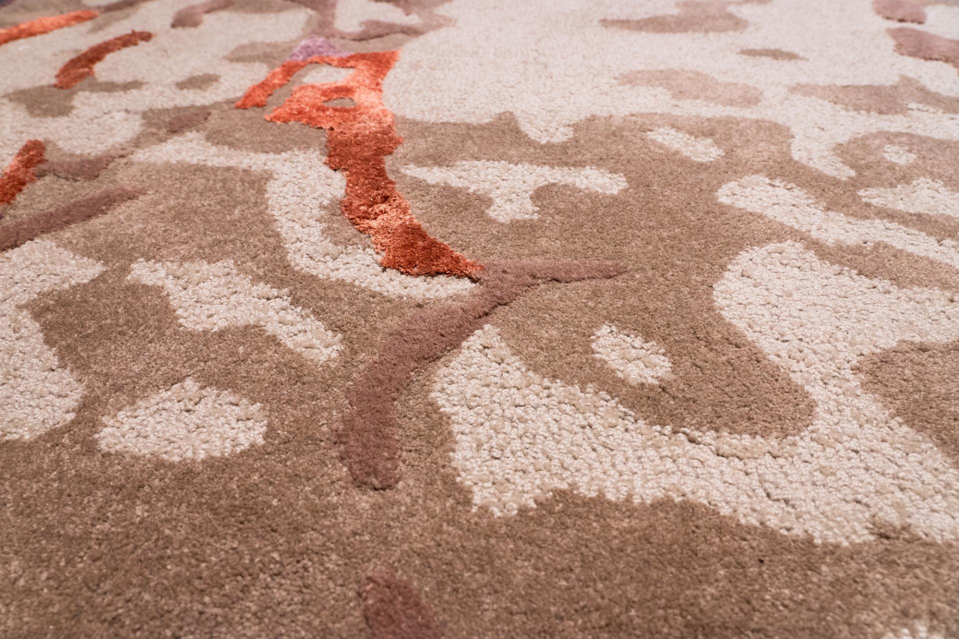 Bespoke rug featuring an organic design with earthy tones, inspired by biomaterials, crafted by Newhey for Material Source Studio.