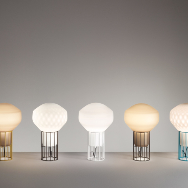 Limited edition Aérostat lamps by Guillaume Delvigne showcasing unique designs and varying colors in a sleek setting.
