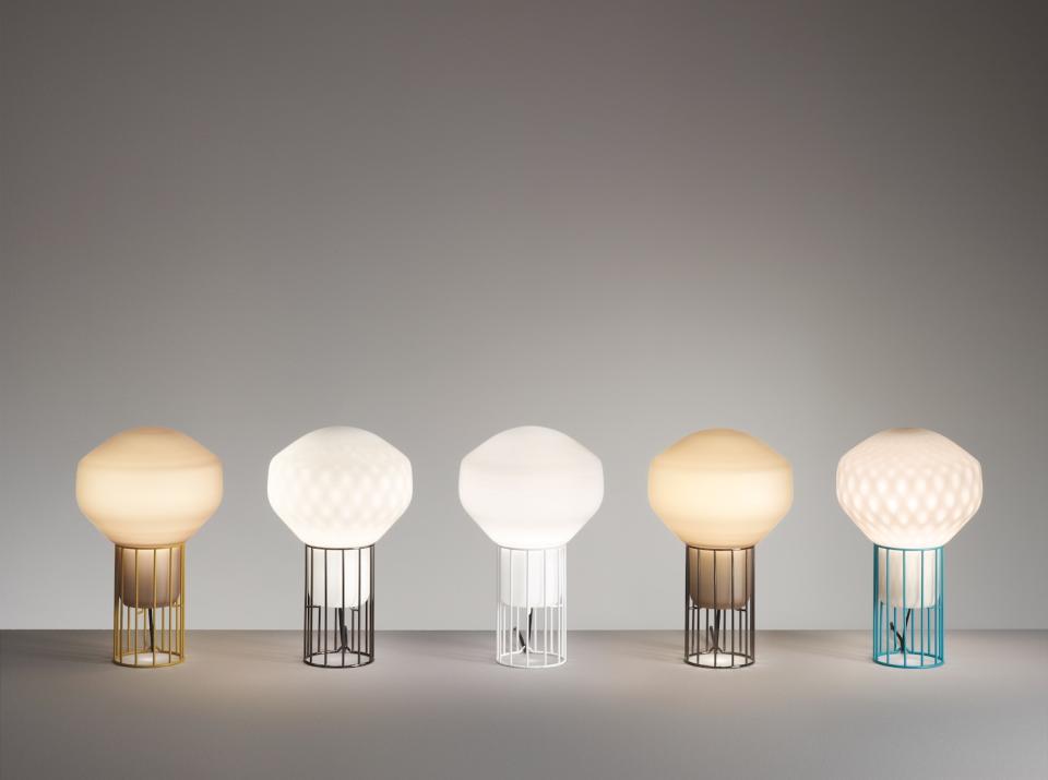 Limited edition Aérostat lamps by Guillaume Delvigne showcasing unique designs and varying colors in a sleek setting.