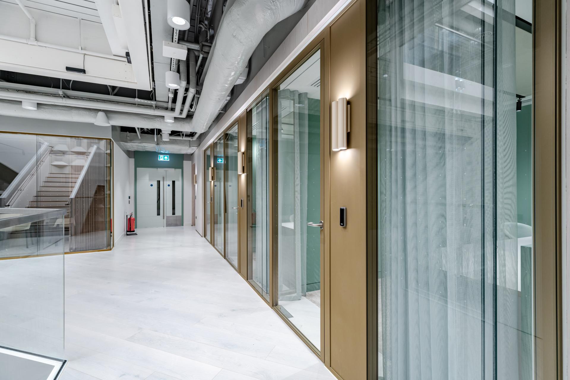 Exceptional experience: Basha Franklin crafts scheme for Myo with tailored glazed partition package from Radii.