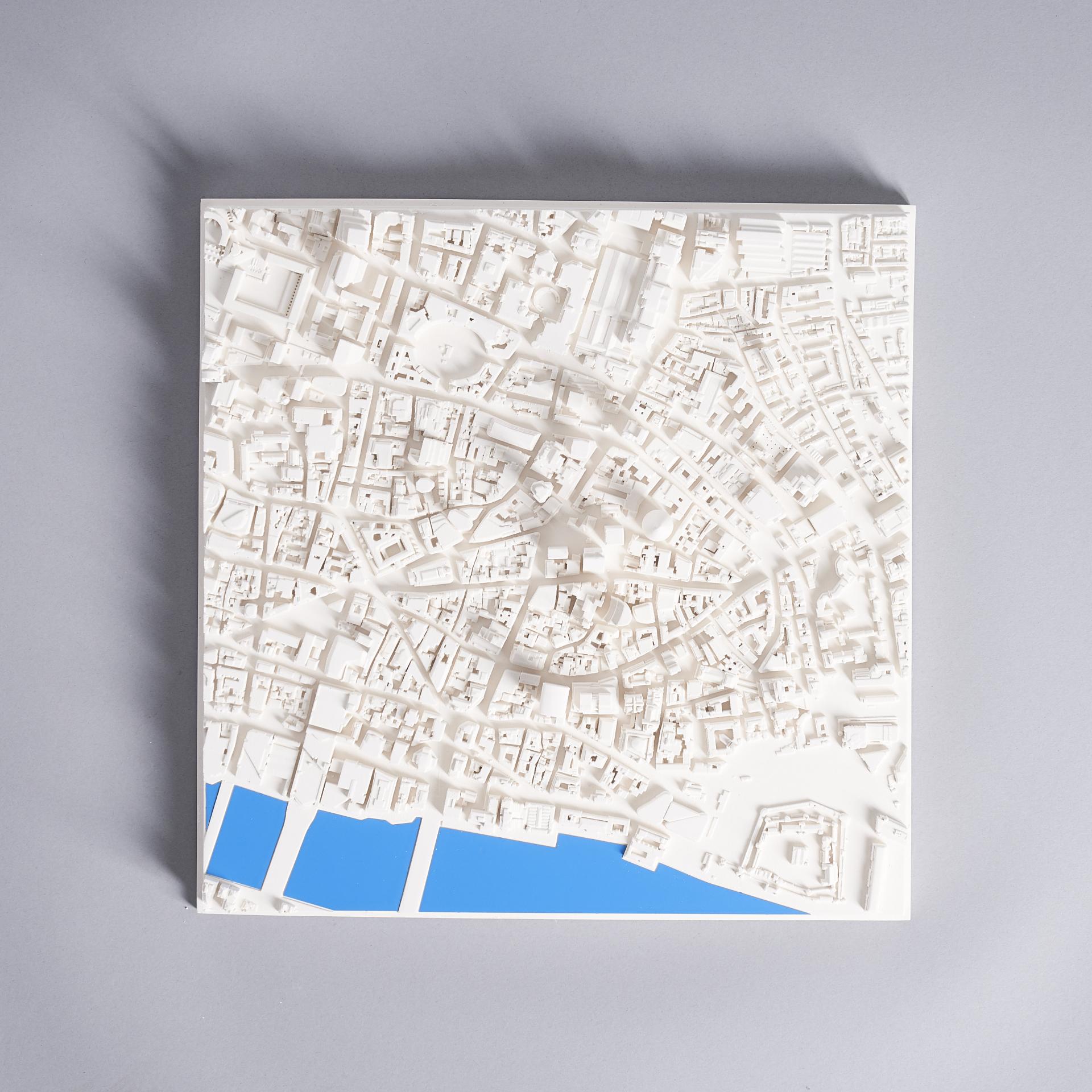 Detailed 3D city model featuring intricate architectural features and waterways, illustrating urban landscape creativity by Chisel & Mouse.