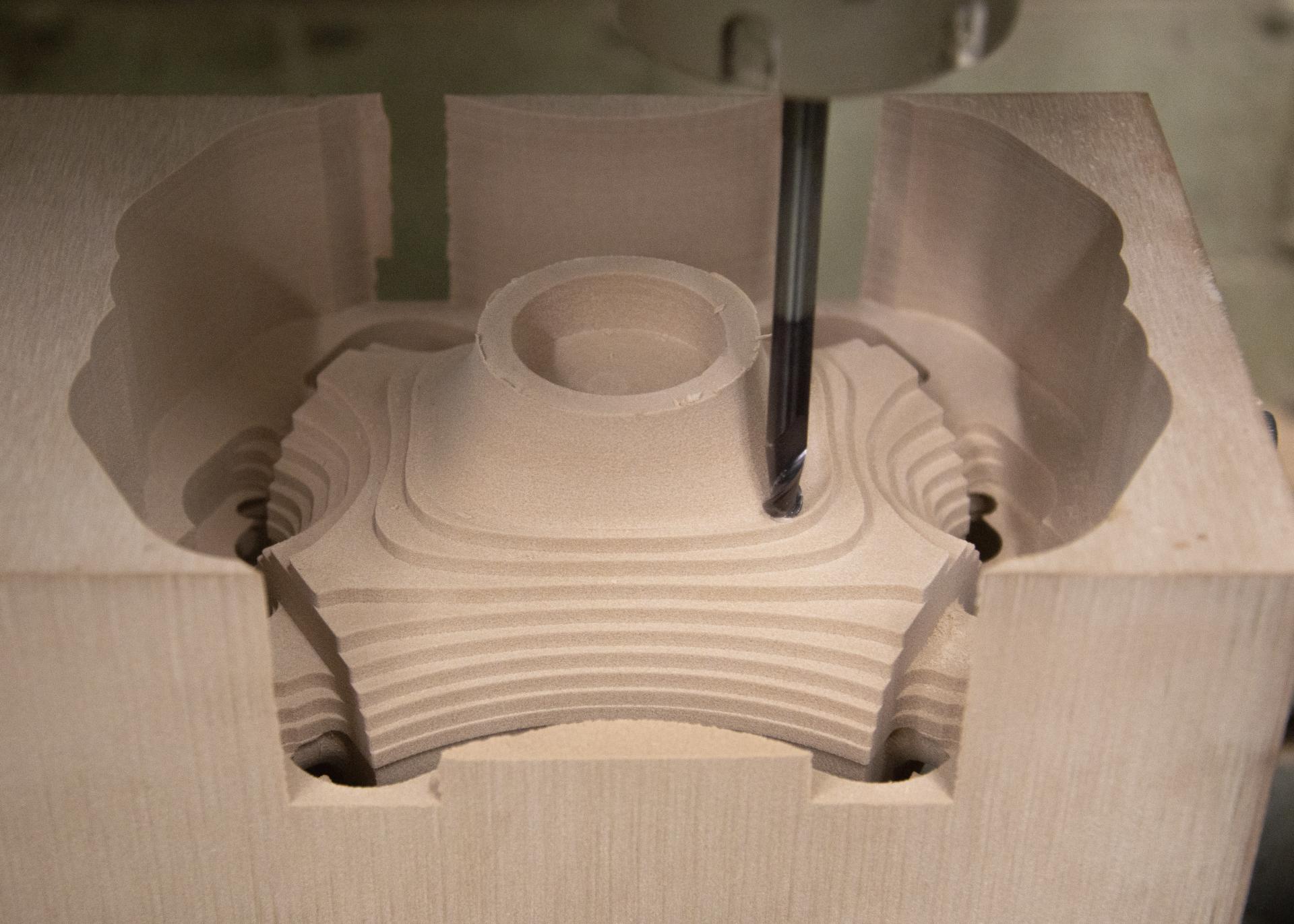 Terracotta mold being intricately milled for innovative urban cooling solutions by the TerraCool project.