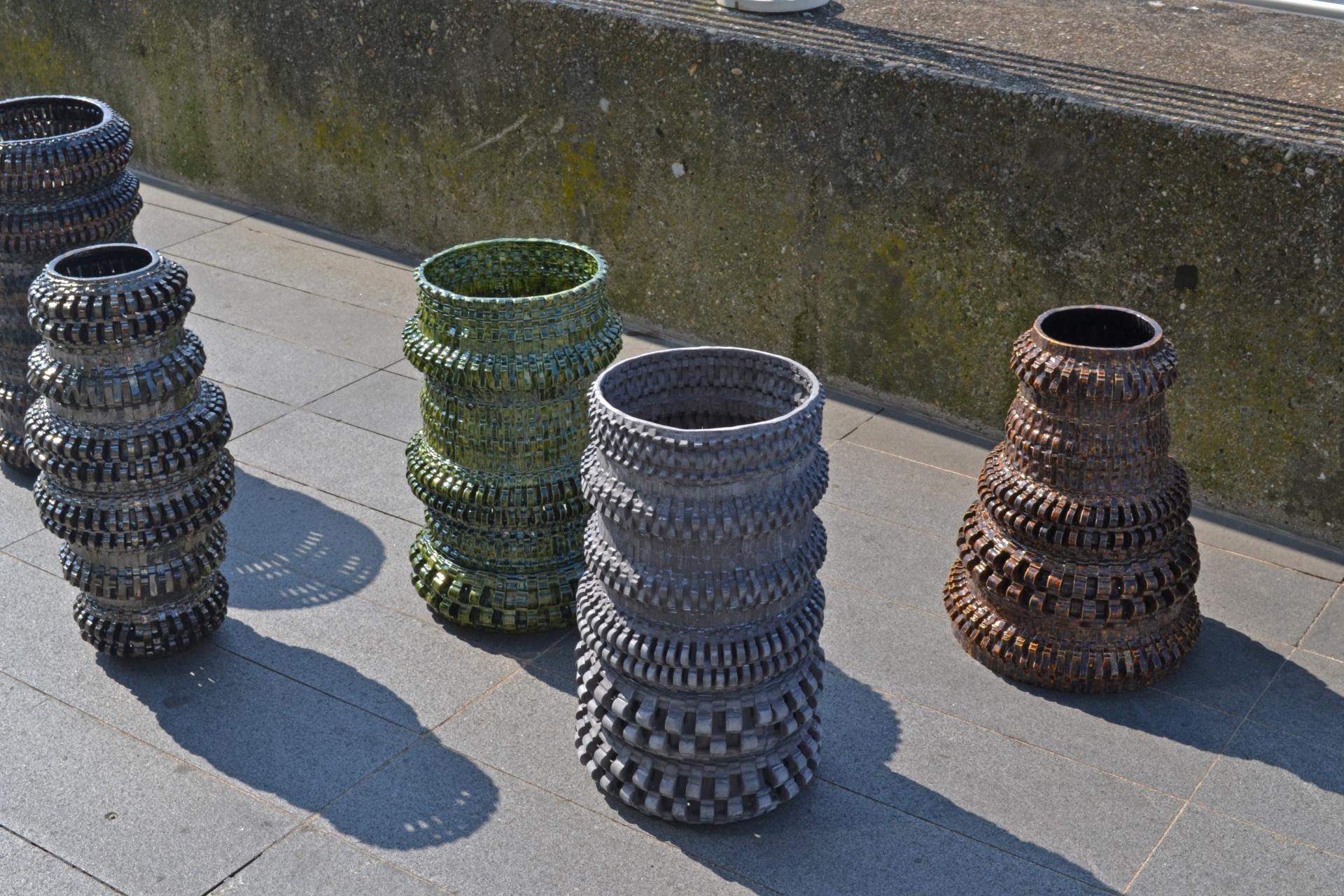 Colorful textile sculptures by Freyja Dorren displayed outdoors, showcasing innovative design for the Anatomy of a City project.