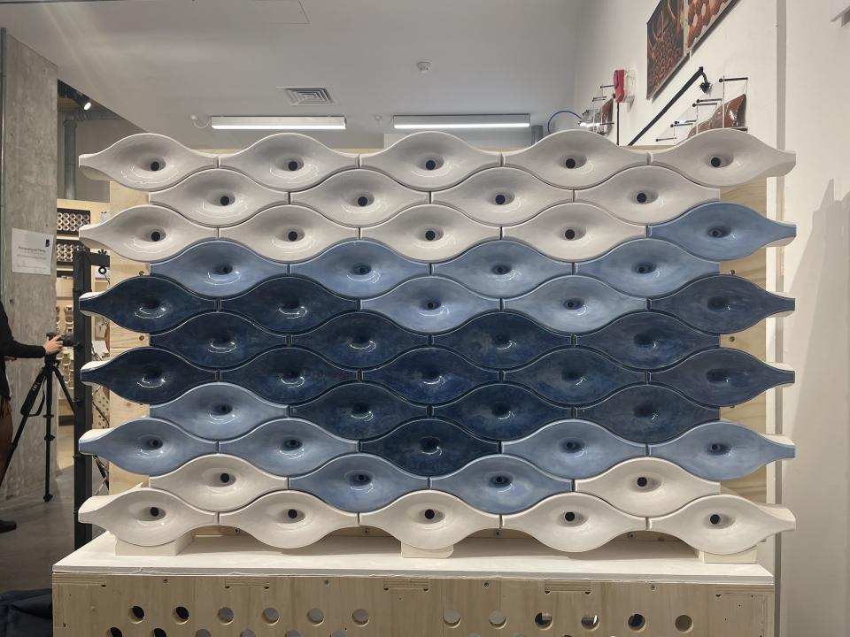 Ceramic sound-absorbing tiles designed to reduce noise pollution, displayed at the Bartlett School of Architecture.