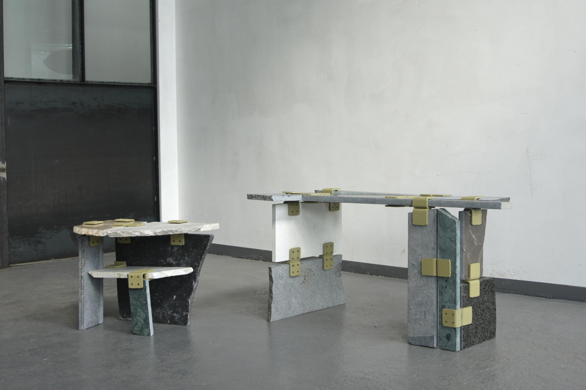 Stylish modular furniture pieces showcasing innovative design and craftsmanship at Dutch Design Week 2024, featuring textured stones and metal accents.