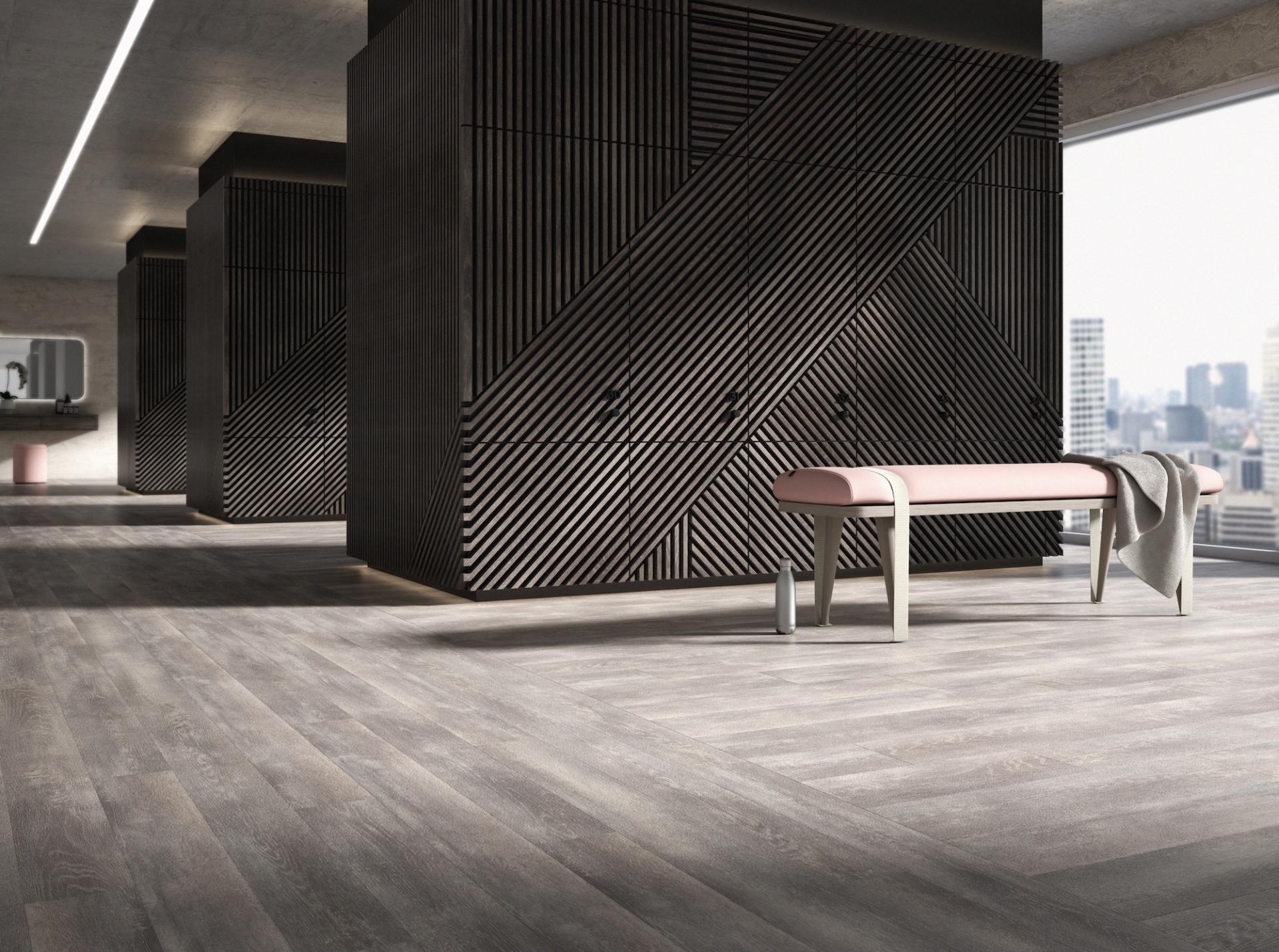 Stylish safety flooring in a modern interior featuring sleek design elements and natural light.