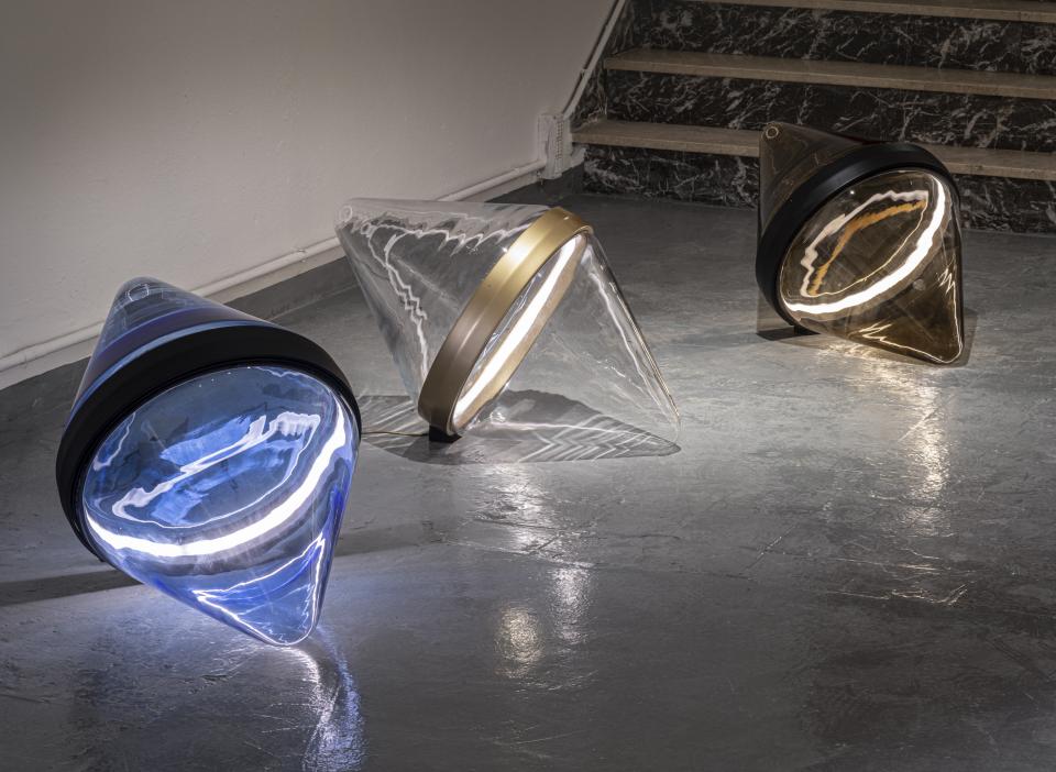 Three unique glass light sculptures with integrated lighting displayed at the GLASS to GLASS exhibit during the Venice Biennale.