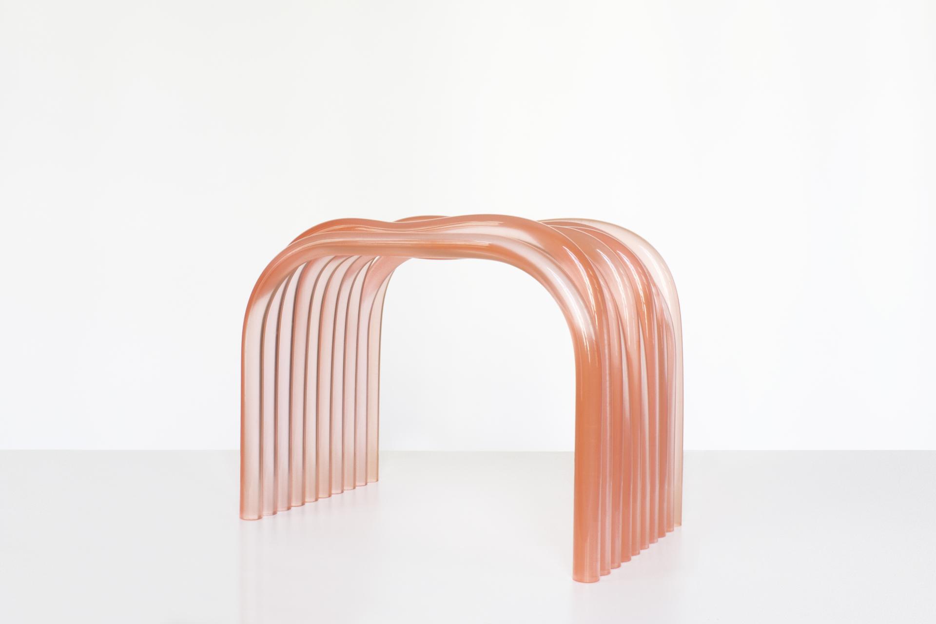 Elegant pink glass console table designed for the Matérialité collection showcased at Paris Design Week.