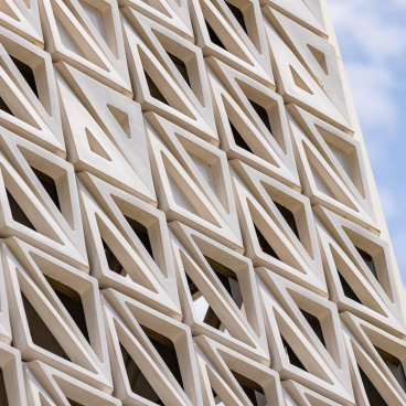 Ventilated ceramic façade of Elm House, Brighton University’s business school, showcasing a modern geometric design.