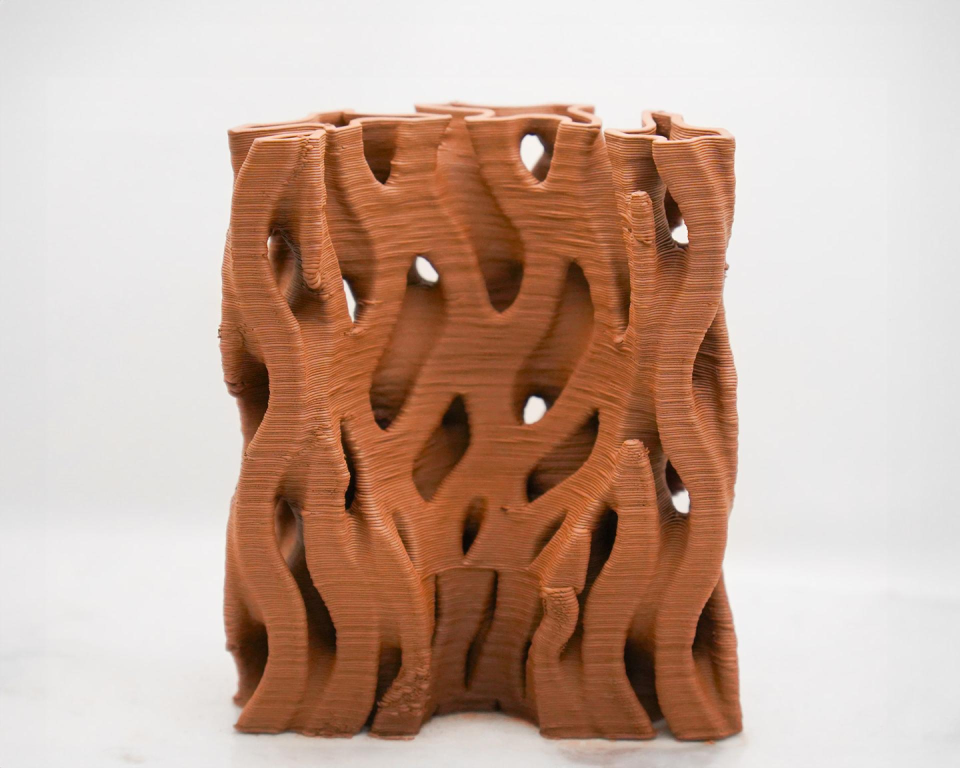 3D-printed clay sculpture showcasing innovative design for energy-efficient building cooling solutions by Rameshwari Jonnalagadda.