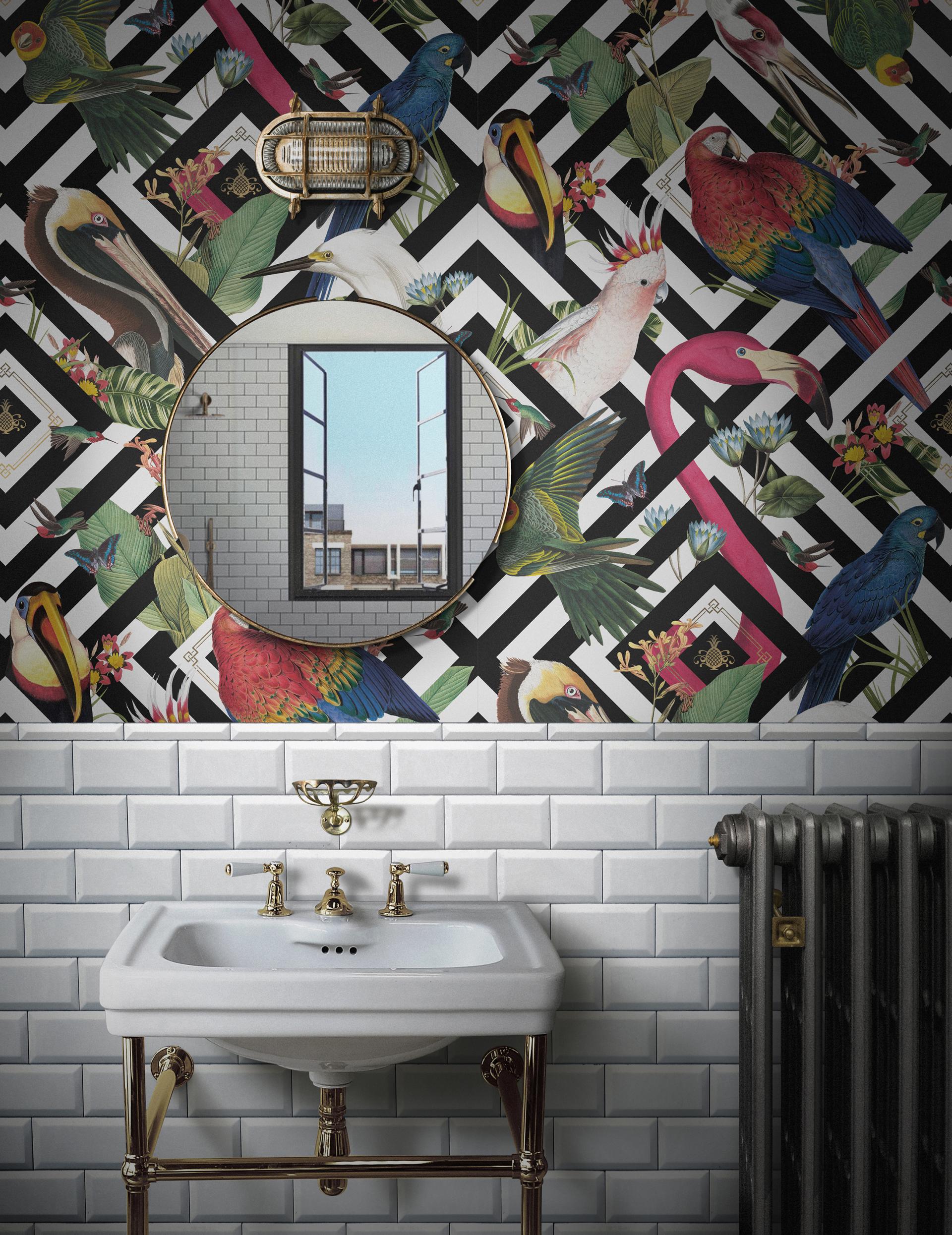 Elegant bathroom with vintage sink, classic subway tiles, and vibrant bird-themed wallpaper, showcasing decadent interior design elements.