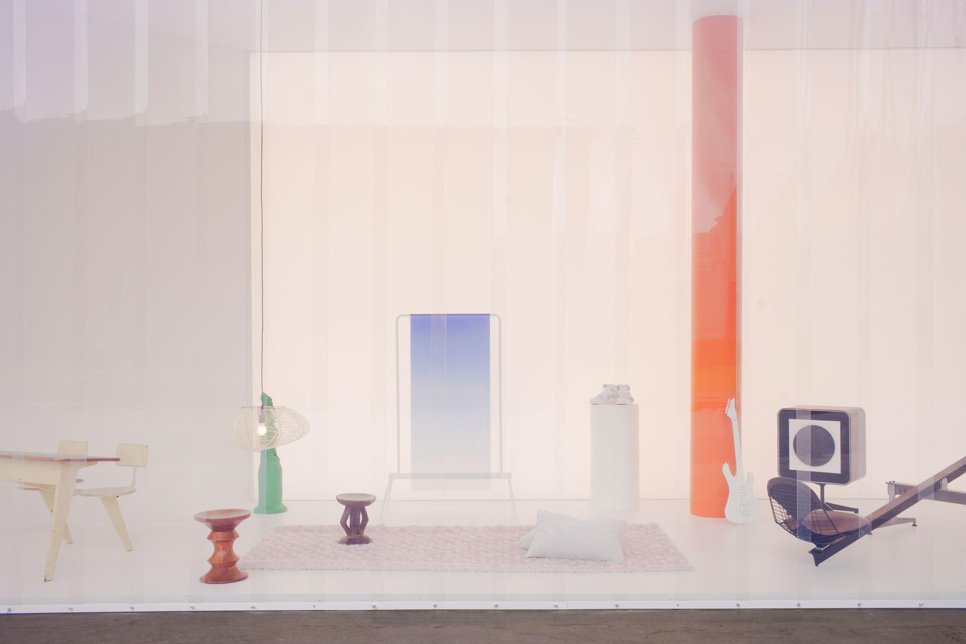 Vitra and Virgil Abloh's innovative collection features a colorful, minimalist interior display of modern furniture and decor.