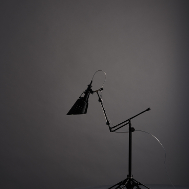 Upcycled lamp made from a repurposed umbrella, showcasing innovative design and sustainability in home decor.