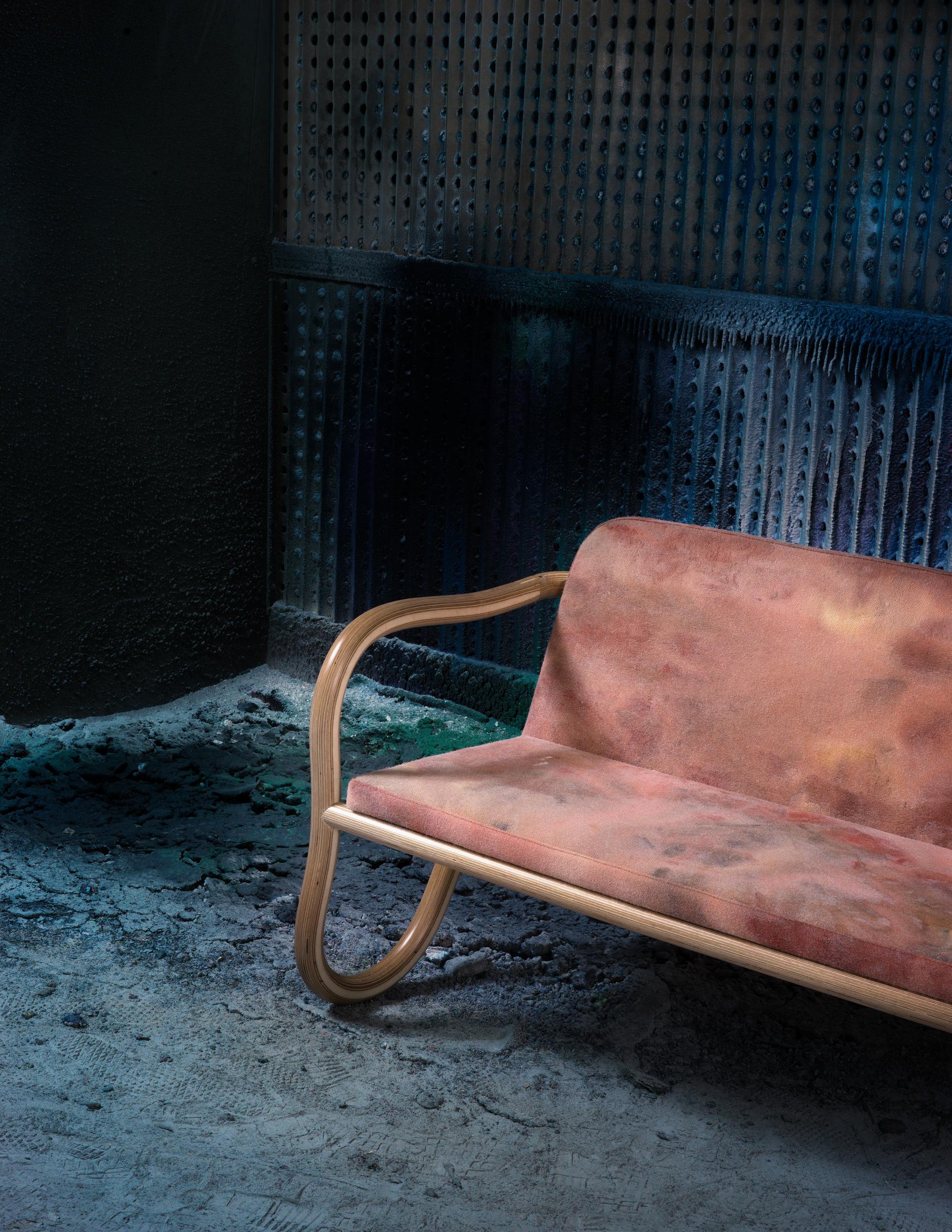 Bespoke Kolho sofa designed by Matthew Day Jackson, featuring a unique fabric and smooth wooden frame.