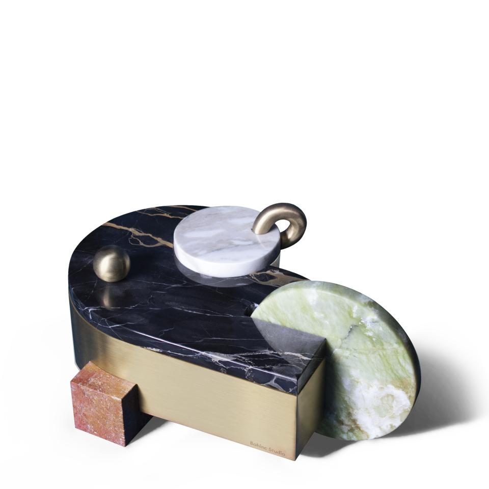 Sculptural abstract design featuring marble, brass, and stone elements, exemplifying Bohinc Studio's innovative approach to furniture design.