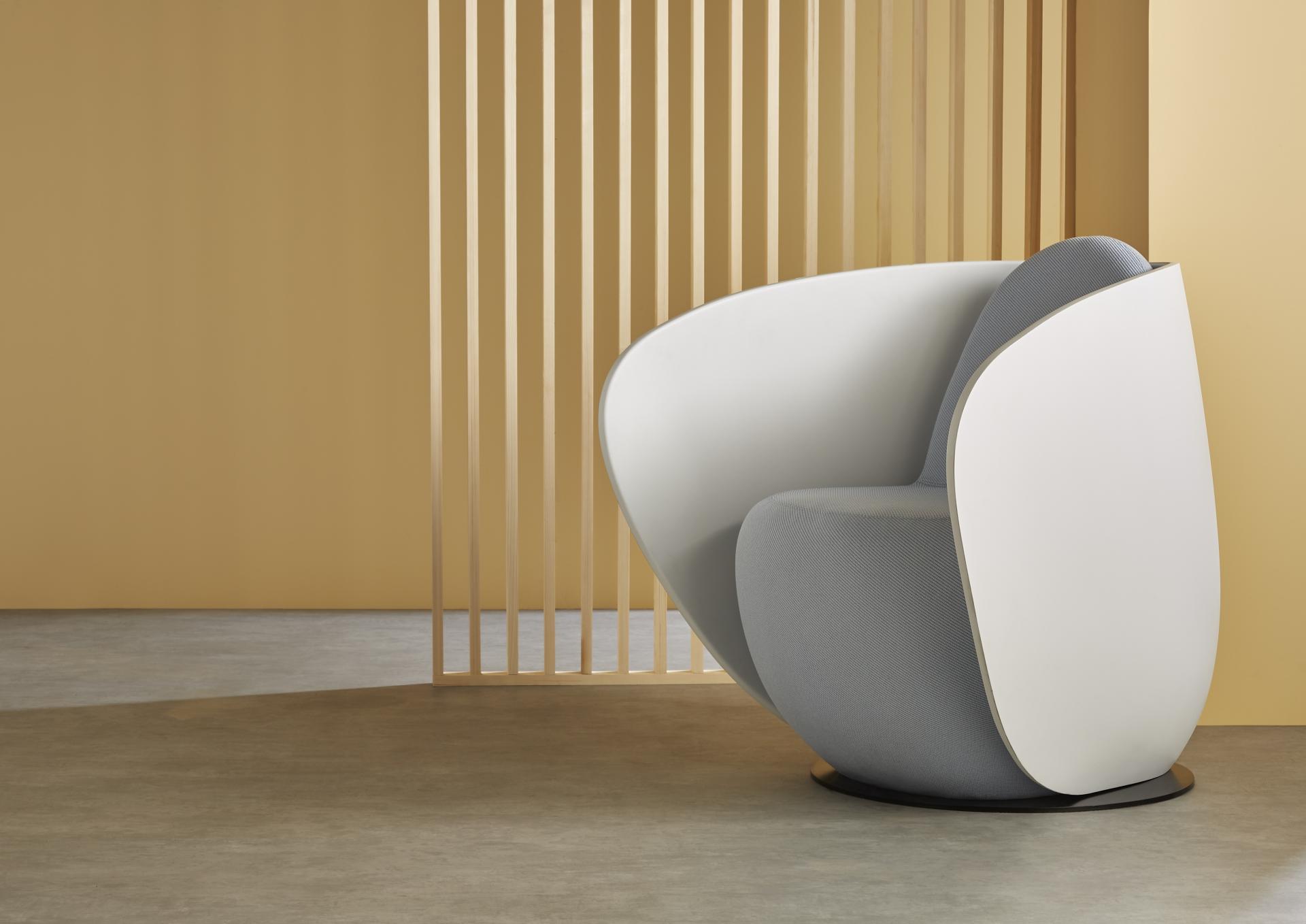 Rounded Relo chair in calming colors, inspired by sea-smoothed stones, enhancing serene workspace aesthetics.