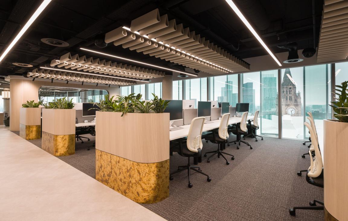 James Lait, senior interior designer, SpaceInvader, on harnessing the power of lighting for Overbury's Manchester workspace.
