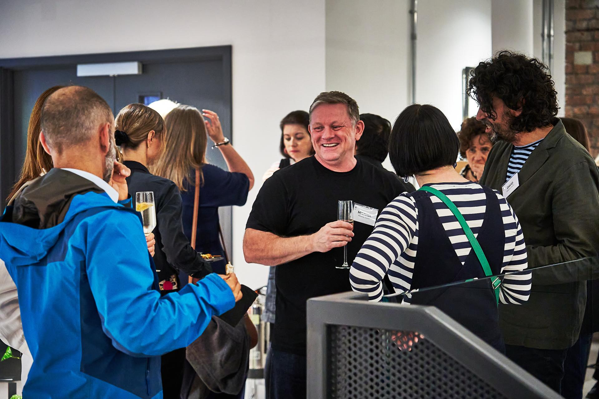 Guests enjoying drinks and networking at the 42 Gathering event, celebrating the podcast 42 Roles in the Built Environment.