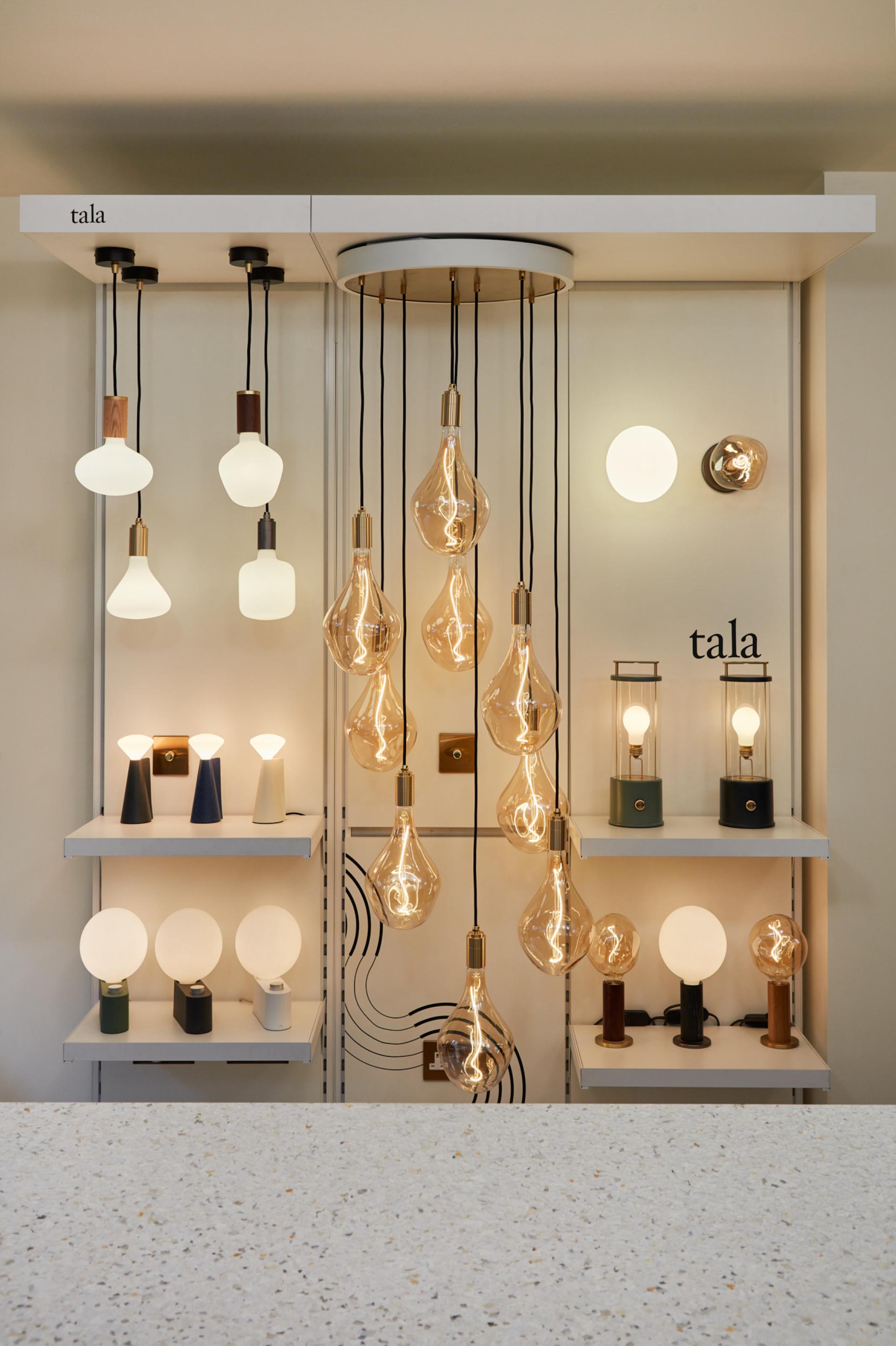 Stylish display of Tala lighting fixtures in Shoreditch showroom, showcasing sustainable design and innovative lighting solutions.