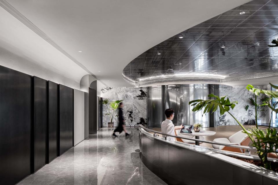 Sleek interior design of the Foshan Vanke Financial Centre, featuring a modern reception area and elegant marble details.