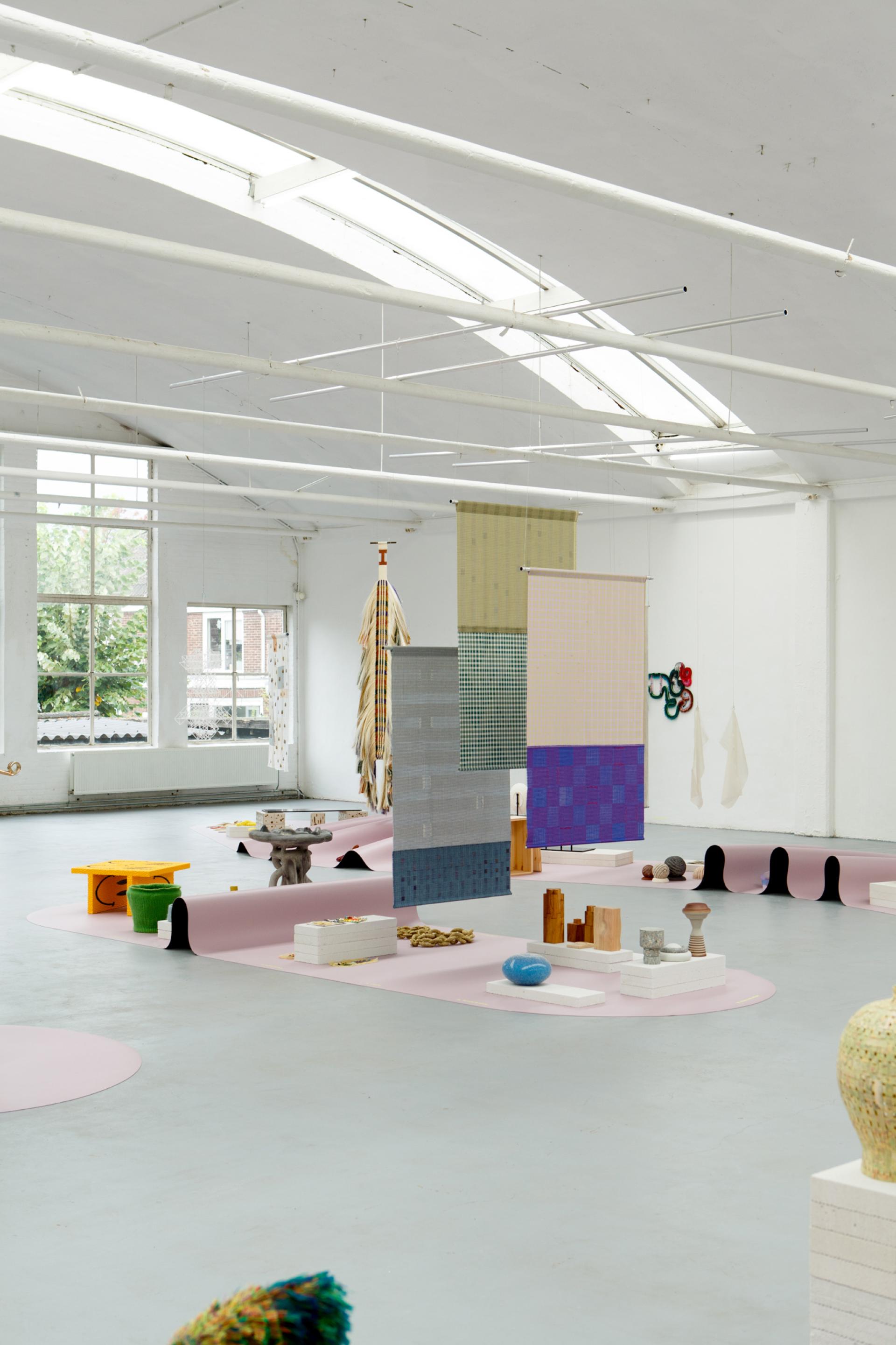 Craft in colour: Forbo’s Furniture Linoleum in Soft Lilac frames HOW&WOW at Dutch Design Week 2025.