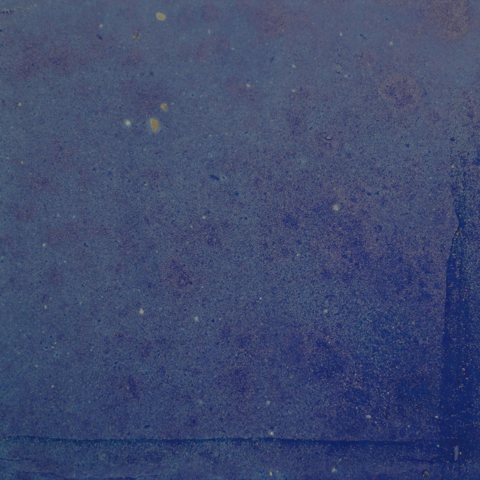 Abstract textured background in shades of blue, reflecting the innovative spirit of DeakinBio's maker in residence initiative.