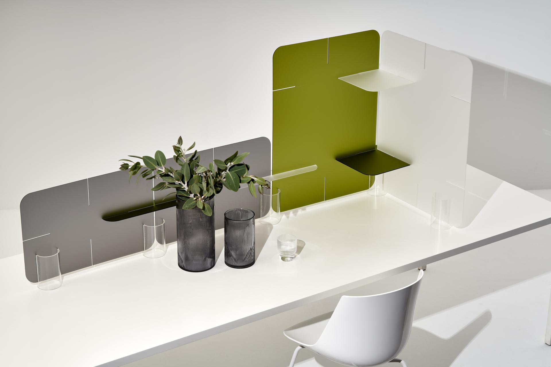 Modern workspace featuring Clikclax partitions by Zahava Elenberg, enhancing collaboration while ensuring social distancing.