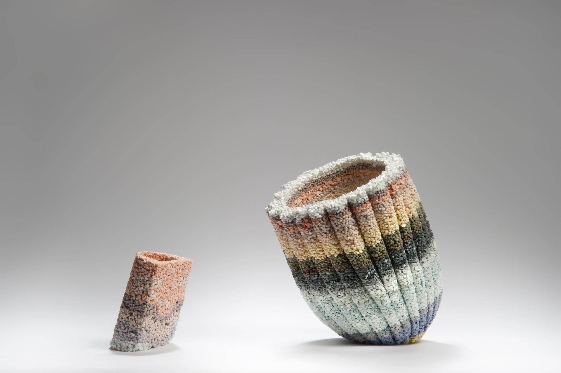 Colorful textured ceramic sculptures showcasing innovative design by experimental UK artists at Hauser & Wirth Somerset exhibition.