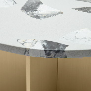 Elegant tabletop featuring unique marble inlays, emphasizing craftsmanship and design by architectural studio Maison Arabella.