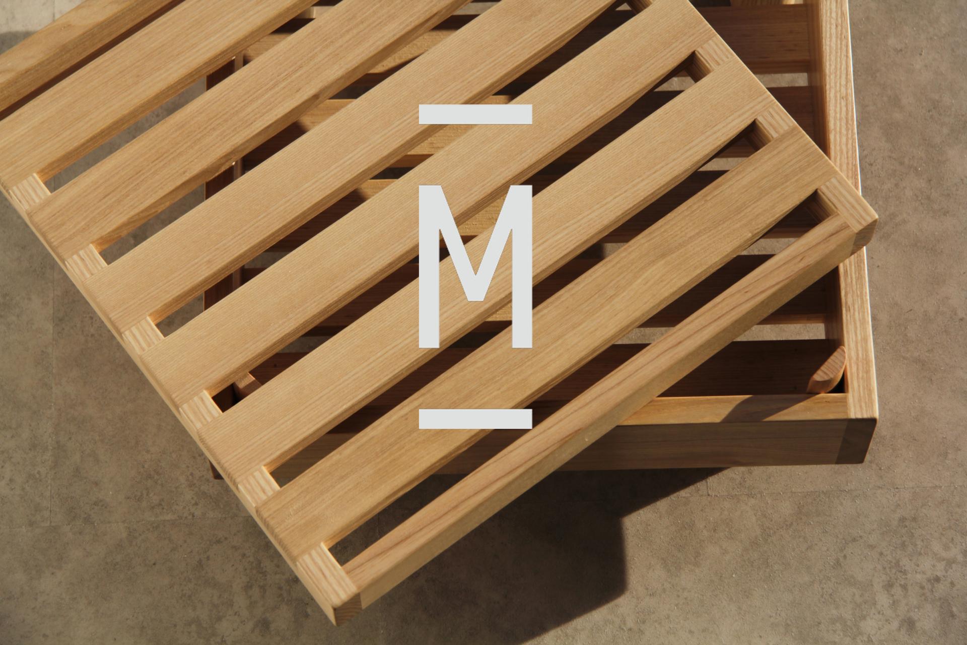 Wooden slatted tray designed by Jesse Cracknell, showcasing craftsmanship in contemporary design and maker culture.