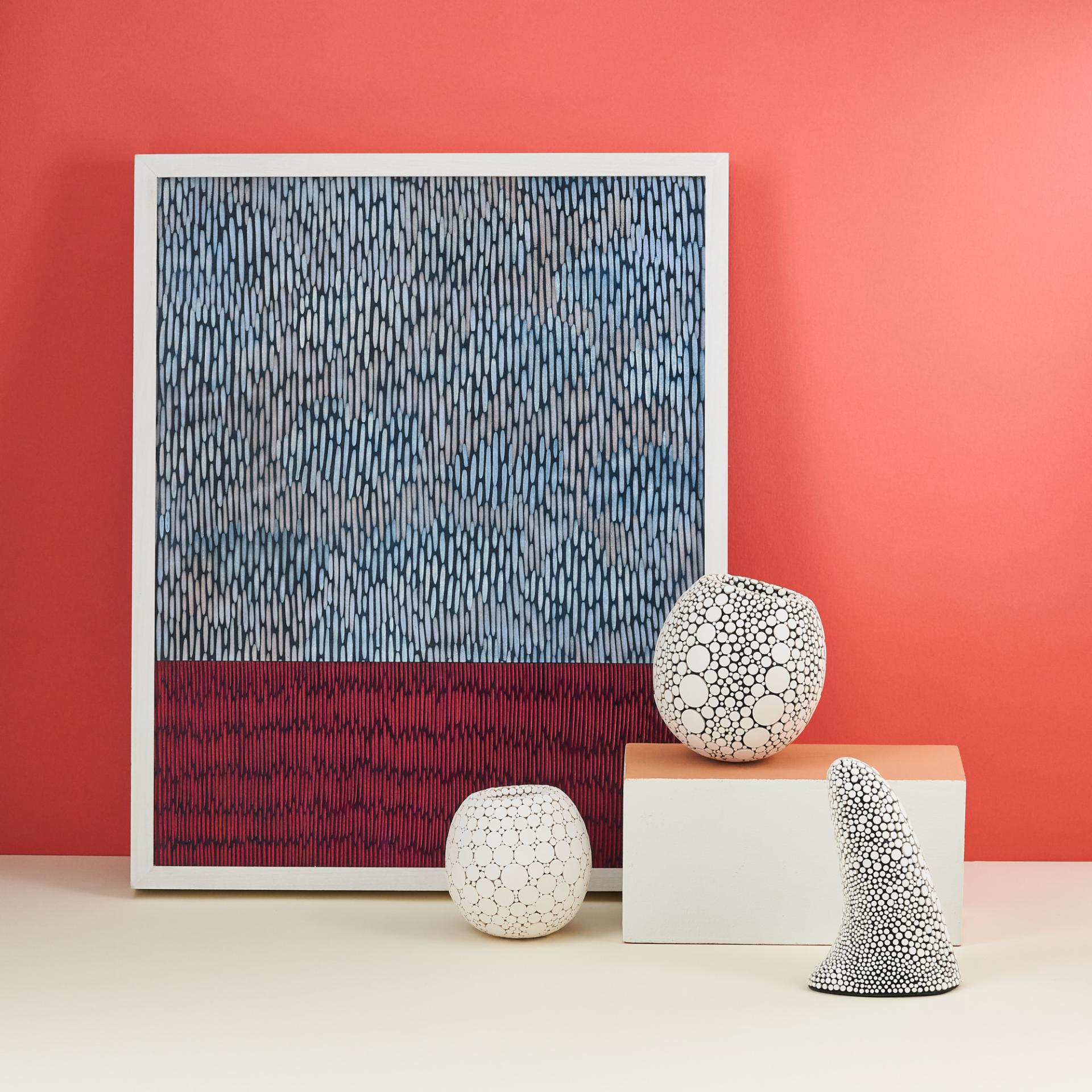 Colorful abstract art with textured vases, highlighting innovative design trends at New Designers 2019 showcase.