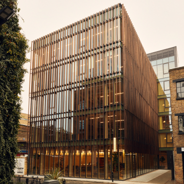 Sleek timber design of the Black & White Building highlights sustainable architecture in an urban setting.