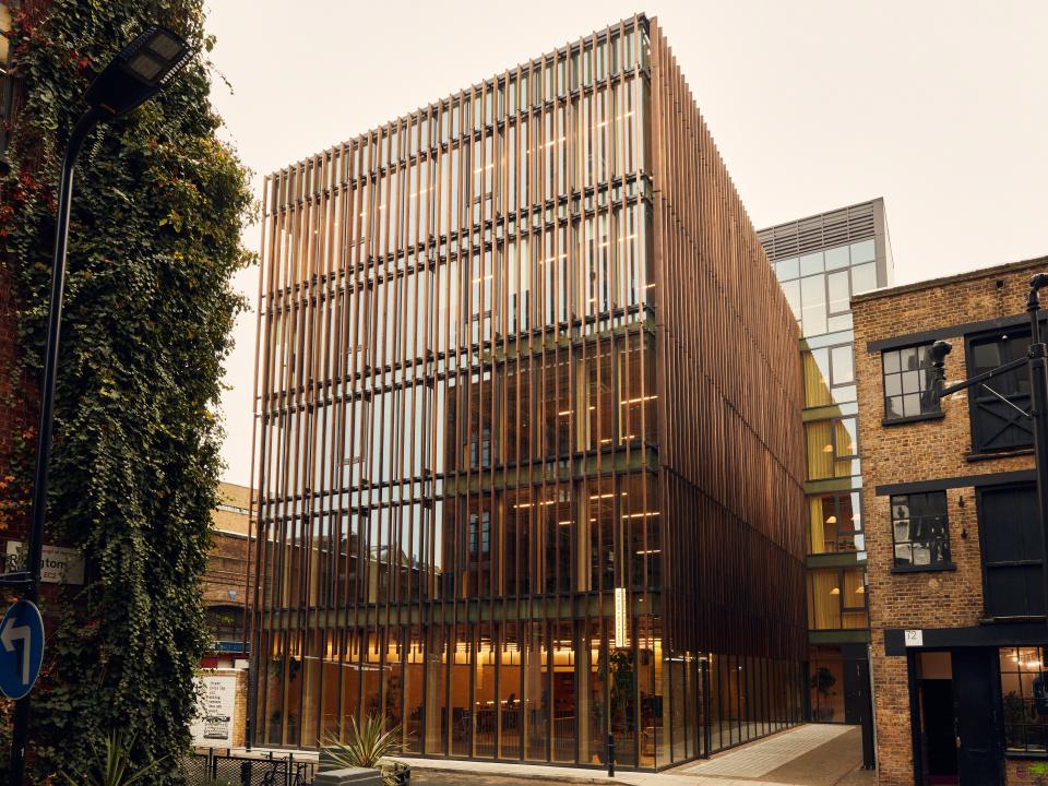 Sleek timber design of the Black & White Building highlights sustainable architecture in an urban setting.