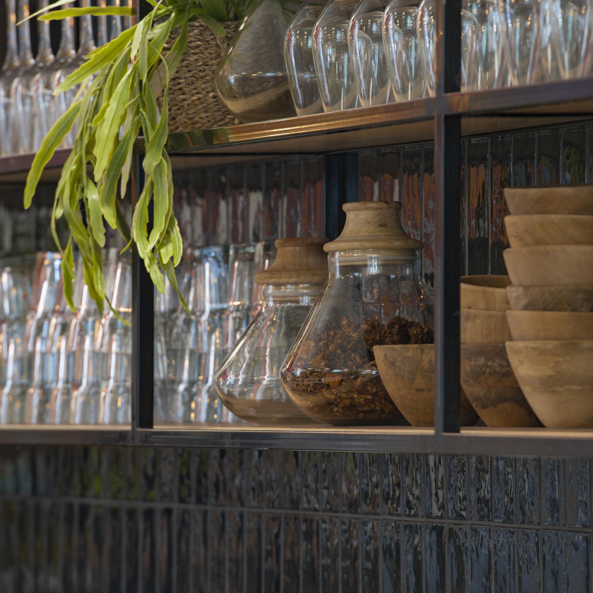 Stylish display of glass jars and wooden bowls at the new Spicer & Cole concession in the RWA, Bristol.