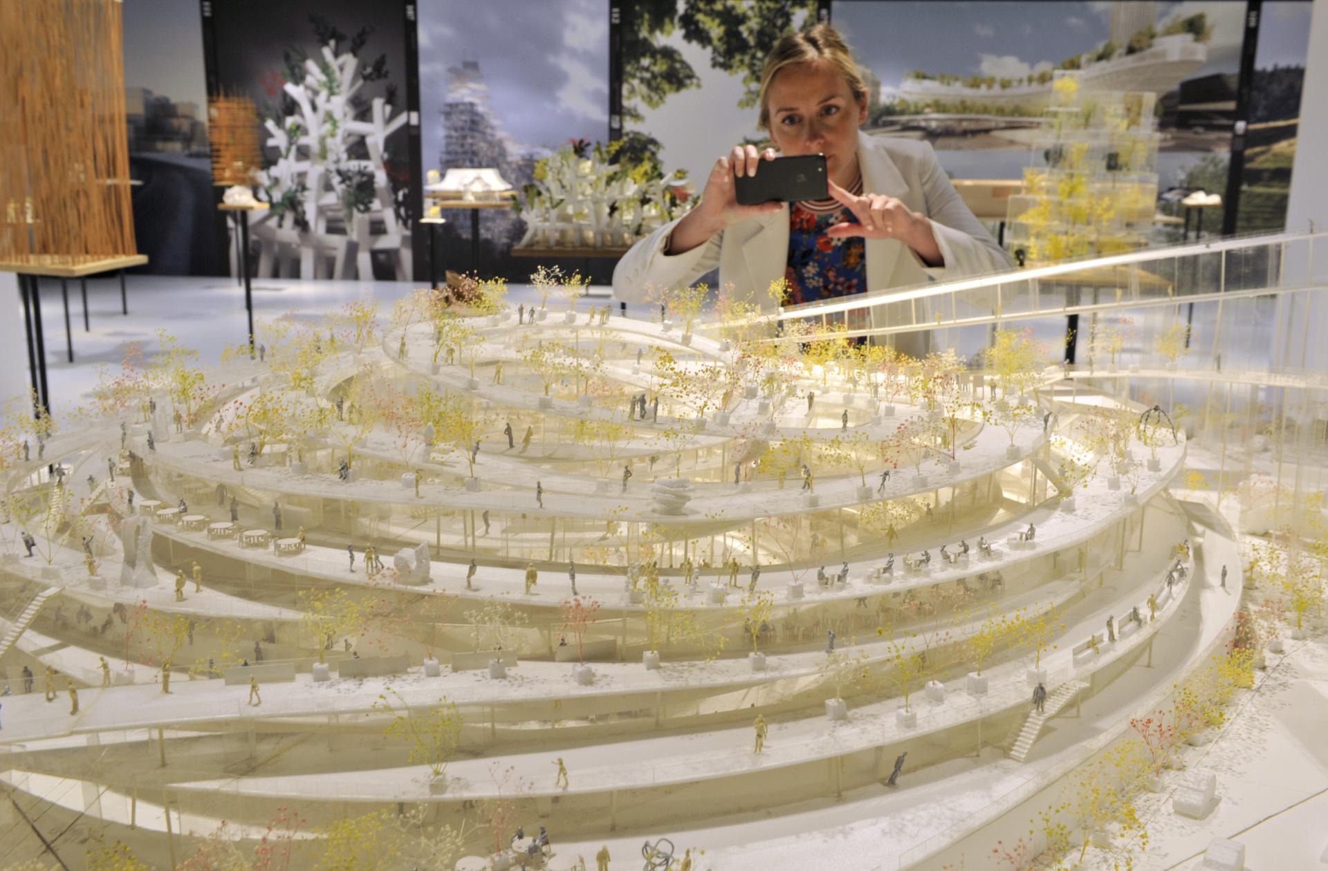 Sou Fujimoto's architectural model features layered landscapes with miniature figures and elegant trees, showcased at Japan House London.