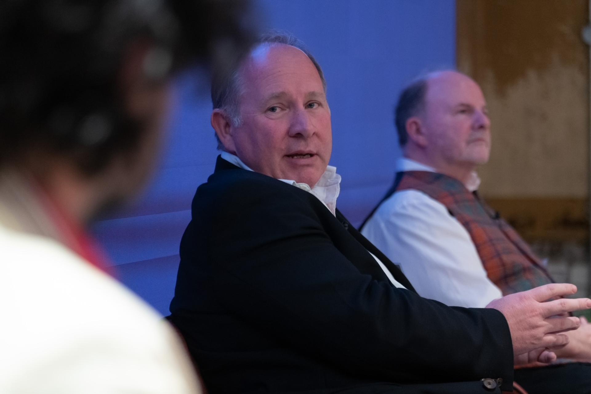 Panel discussion at Material Source Studio event on the future of hospitality, featuring engaged speakers sharing insights.