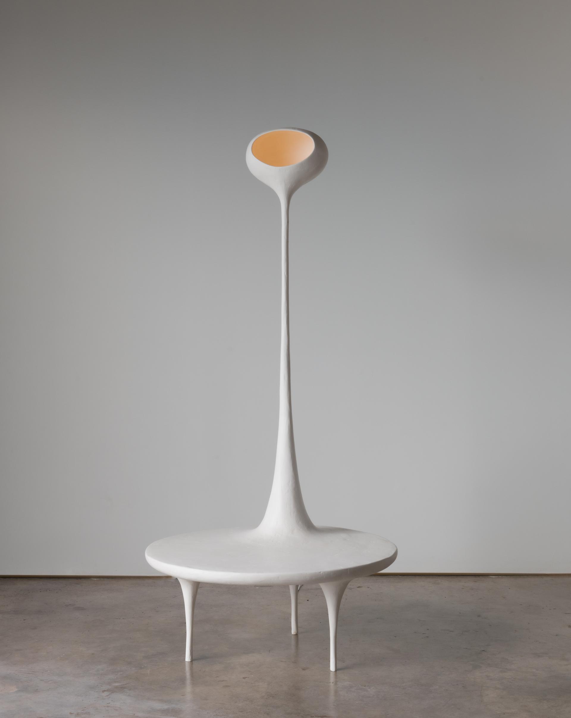Sculptural white lamp with a minimalistic design, featured in Reynold Rodriguez's solo show at Charles Burnand Gallery.