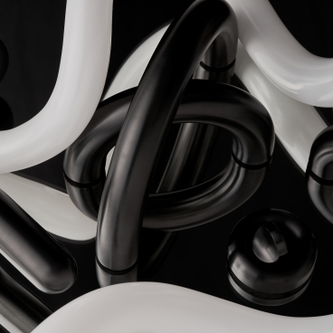 Sculptural arrangement of black and white tubing representing innovative design in the Material Source Studio.