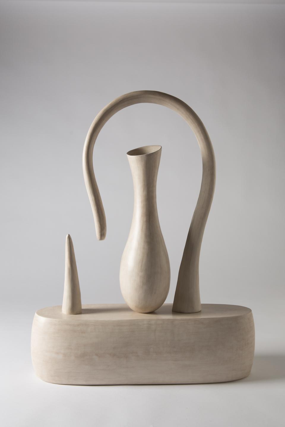 Sculptural modern craft piece featuring an elegant vase and curved forms, showcasing contemporary design at the Collect art fair.