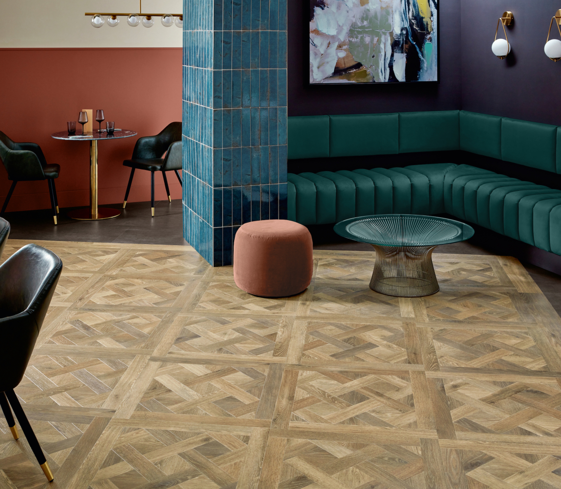 Stylish interior featuring Amtico's Signature patterned flooring, complemented by modern furnishings and vibrant decor elements.