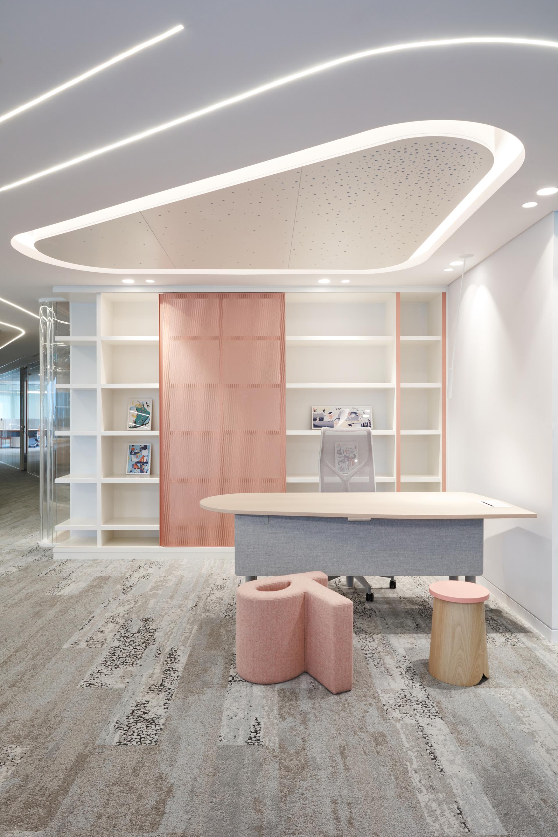 Contemporary office design featuring playful furniture and a light-filled reception area for early childhood initiatives.