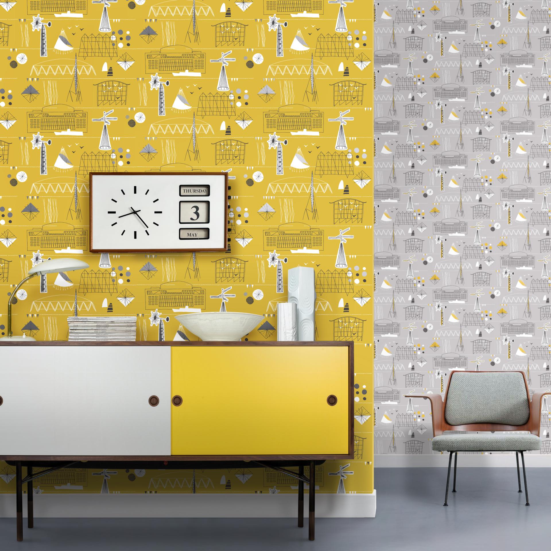 Vibrant yellow and gray coastal-themed wallpaper designs adorn a modern interior with stylish furniture and decor.