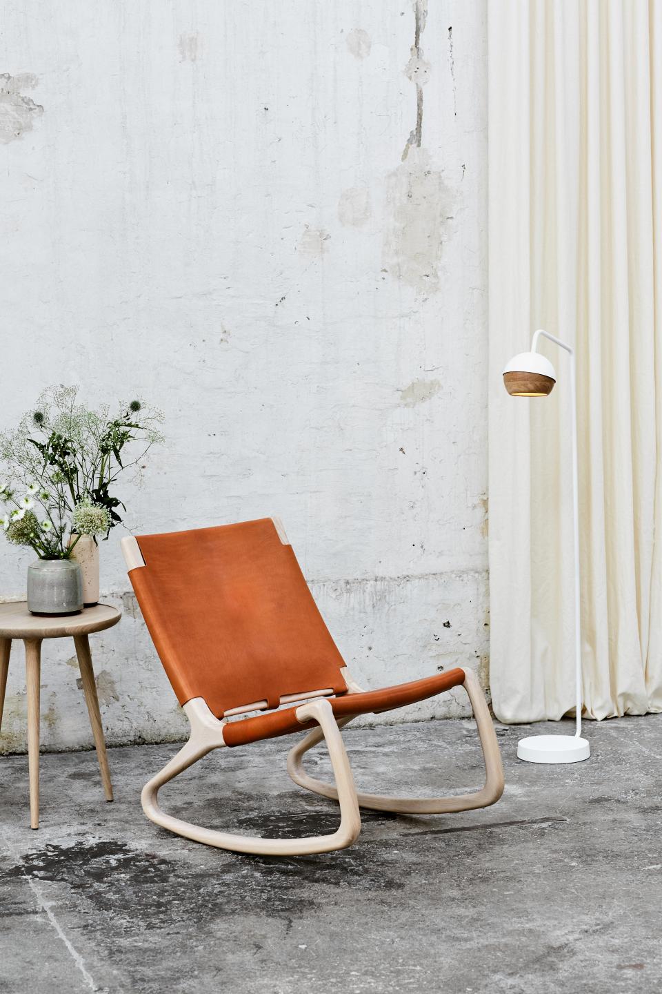 Elegant rocking chair by Mater, designed by Shawn Place, showcasing minimalist design and West Coast indigenous art inspiration.